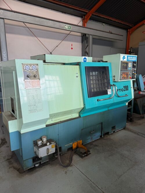 WhatsApp Image 2026-04-14 at 16.52.40 FEELER CNC Slant Bed Lathe – Fanuc OiT | 12-Station Turret | Hydraulic Chuck & Tailstock | Production CNC Turner